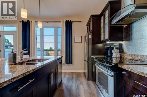 137 3229 Elgaard Drive, Regina, SK - Indoor Photo Showing Kitchen With Double Sink
