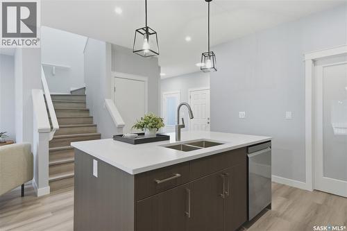 143 Sharma Lane, Saskatoon, SK - Indoor Photo Showing Kitchen With Double Sink