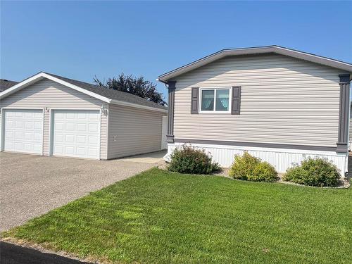 68 Bluebird Crescent, Brandon, MB - Outdoor With Exterior