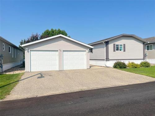 68 Bluebird Crescent, Brandon, MB - Outdoor With Exterior