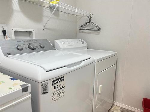 68 Bluebird Crescent, Brandon, MB - Indoor Photo Showing Laundry Room