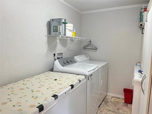 68 Bluebird Crescent, Brandon, MB - Indoor Photo Showing Laundry Room