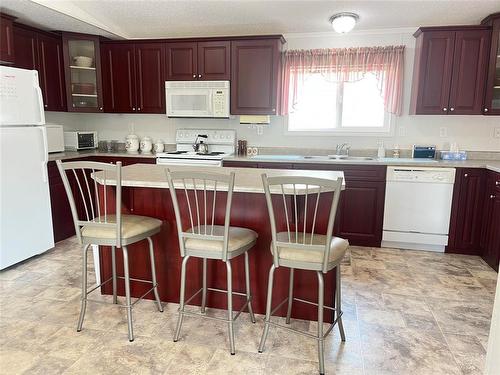 68 Bluebird Crescent, Brandon, MB - Indoor Photo Showing Kitchen