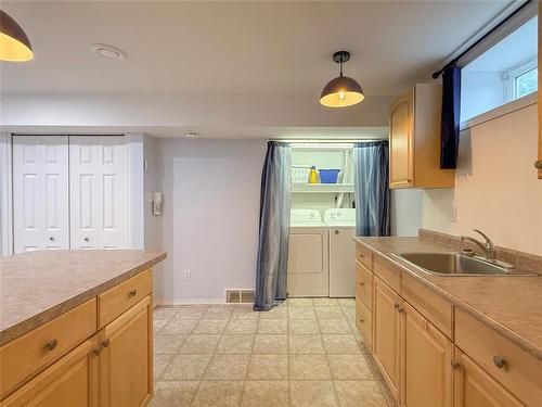 1106 Louise Avenue E, Brandon, MB - Indoor Photo Showing Kitchen
