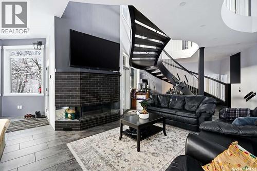 3601 Grassick Avenue, Regina, SK - Indoor Photo Showing Living Room With Fireplace
