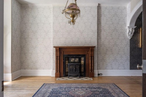 122 East Avenue S, Hamilton, ON - Indoor Photo Showing Other Room With Fireplace