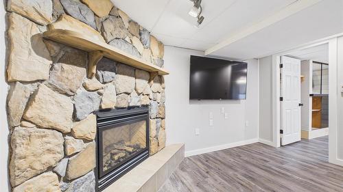 1305 10Th Avenue, Cranbrook, BC - Indoor Photo Showing Living Room With Fireplace