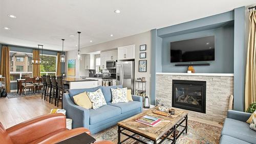 37-2490 Tuscany Drive, West Kelowna, BC - Indoor Photo Showing Living Room With Fireplace
