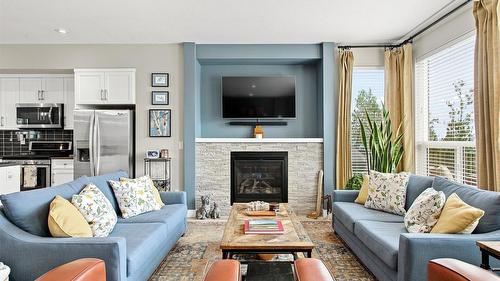37-2490 Tuscany Drive, West Kelowna, BC - Indoor Photo Showing Living Room With Fireplace
