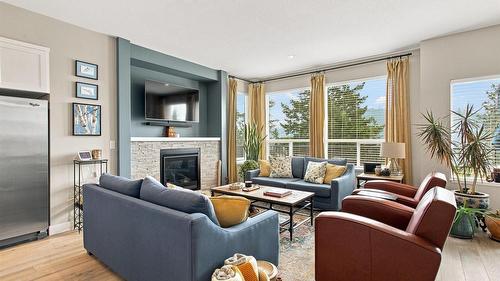 37-2490 Tuscany Drive, West Kelowna, BC - Indoor Photo Showing Living Room With Fireplace