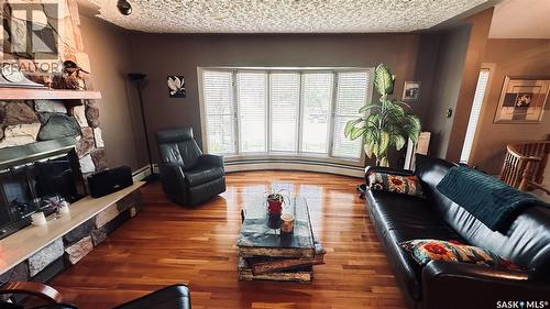 816 1St Avenue, Zenon Park, SK - Indoor Photo Showing Living Room With Fireplace
