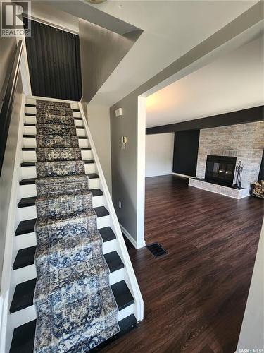 430 3Rd Street, Estevan, SK - Indoor Photo Showing Other Room With Fireplace