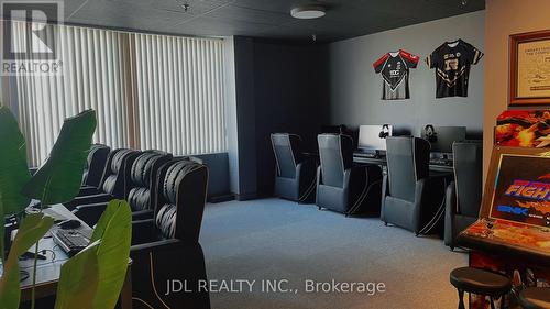 Theature room - 202 - 70 Valleywood Drive, Markham, ON 