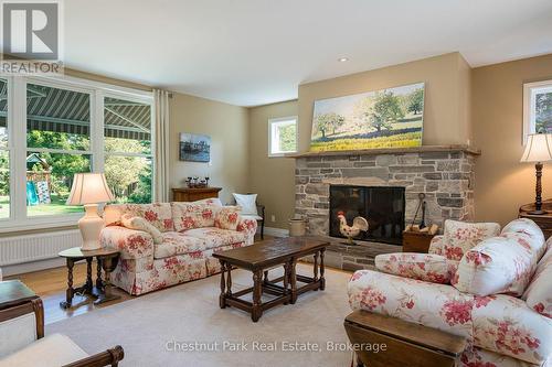 Cozy wood burning fireplace for cold winter nights - 71 Hickory Street, Collingwood, ON - Indoor Photo Showing Living Room With Fireplace