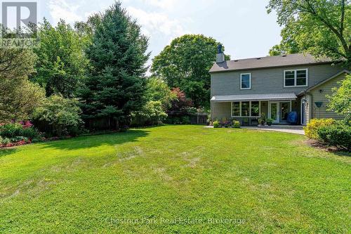Lots of backyard for kids, pets and entertaining - 71 Hickory Street, Collingwood, ON - Outdoor With Deck Patio Veranda
