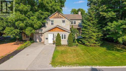 Parking in the driveway for 2 cars and 1 in garage - 71 Hickory Street, Collingwood, ON - Outdoor With Facade