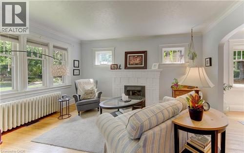 with natural gas fireplace - 150 Union Boulevard, Kitchener, ON - Indoor Photo Showing Living Room With Fireplace