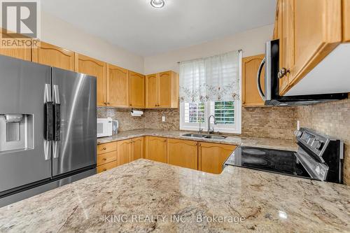 100 Pantomine Boulevard, Brampton, ON - Indoor Photo Showing Kitchen With Double Sink