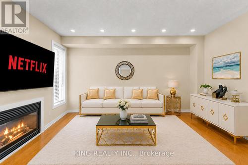 100 Pantomine Boulevard, Brampton, ON - Indoor Photo Showing Living Room With Fireplace