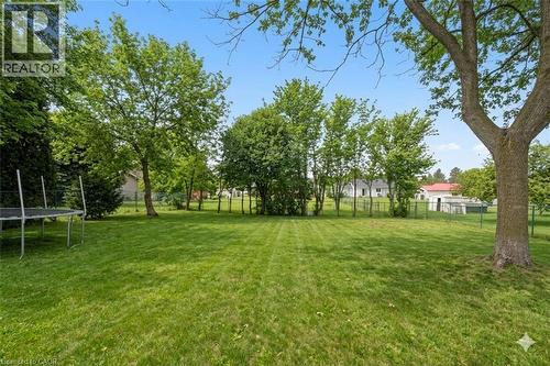 Expansive lawn with mature trees and perimeter fencing - 44 Mcclellan Road, Alton, ON - Outdoor With View
