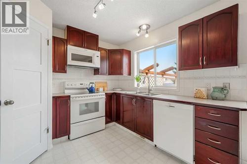 91 Hidden Crescent Nw, Calgary, AB 