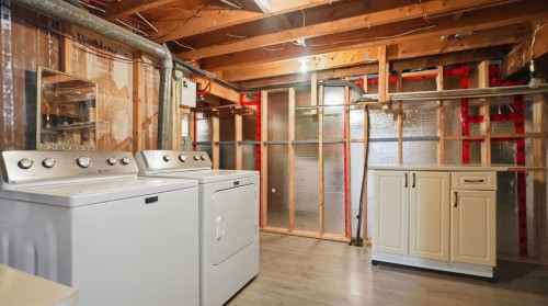 Sous-sol - 755 141E Rue, Saint-Georges, QC - Indoor Photo Showing Laundry Room
