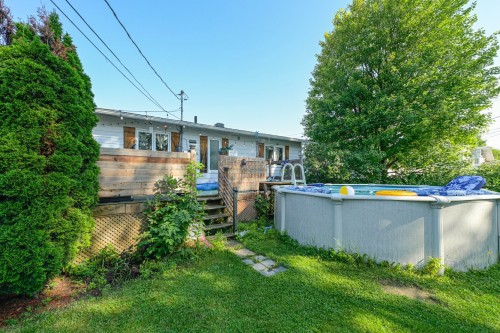 Cour - 1547 Rue Picasso, Beloeil, QC - Outdoor With Above Ground Pool