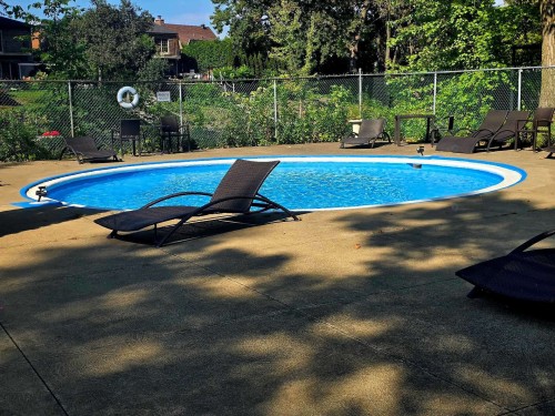 Pool - 1024-2555 Av. Du Havre-Des-Îles, Laval (Chomedey), QC - Outdoor With In Ground Pool With Backyard