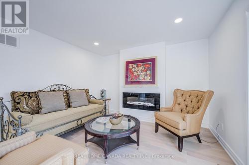 20 Saddletree Drive, Toronto, ON - Indoor Photo Showing Living Room With Fireplace