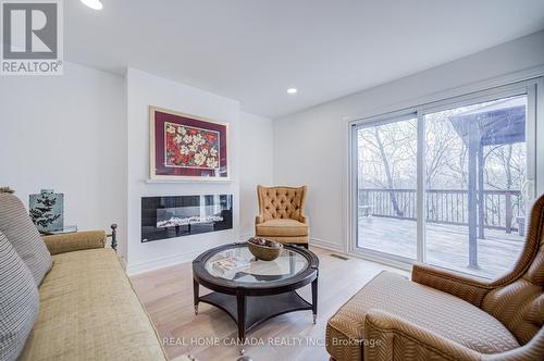20 Saddletree Drive, Toronto, ON - Indoor Photo Showing Living Room With Fireplace