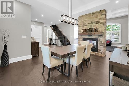 94 Terrence Park Drive, Hamilton (Ancaster), ON - Indoor Photo Showing Dining Room With Fireplace