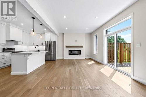 15 - 49 Royal Dornoch Drive, St. Thomas, ON - Indoor Photo Showing Other Room With Fireplace