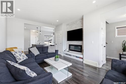 605 Feheregyhazi Boulevard, Saskatoon, SK - Indoor Photo Showing Living Room With Fireplace