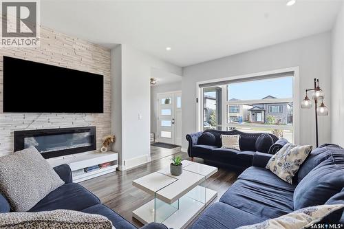 605 Feheregyhazi Boulevard, Saskatoon, SK - Indoor Photo Showing Living Room With Fireplace