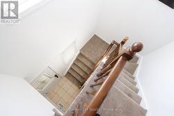 Staircase to the Second Level with New Broadloom. - 