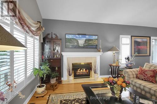 65 Kimberwick Crescent, Ottawa, ON - Indoor Photo Showing Living Room With Fireplace