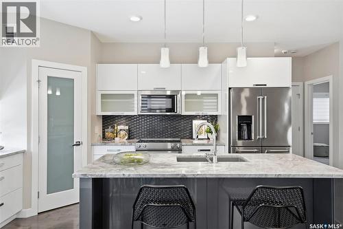 130 Boykowich Bend, Saskatoon, SK - Indoor Photo Showing Kitchen With Stainless Steel Kitchen With Upgraded Kitchen
