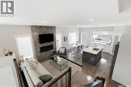 130 Boykowich Bend, Saskatoon, SK - Indoor Photo Showing Living Room With Fireplace