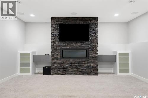 130 Boykowich Bend, Saskatoon, SK - Indoor With Fireplace