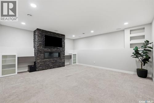 130 Boykowich Bend, Saskatoon, SK - Indoor With Fireplace