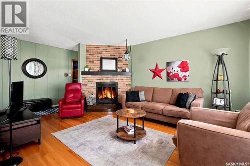 323 Toronto Street N, Regina, SK - Indoor Photo Showing Living Room With Fireplace