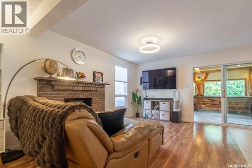 127 Rogers Road, Regina, SK - Indoor Photo Showing Living Room With Fireplace