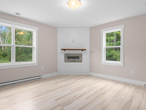 7 Copperhead Road, Fall River, NS - Indoor Photo Showing Living Room With Fireplace