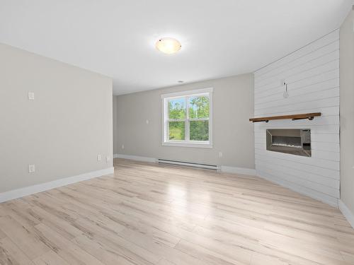 7 Copperhead Road, Fall River, NS - Indoor Photo Showing Other Room With Fireplace