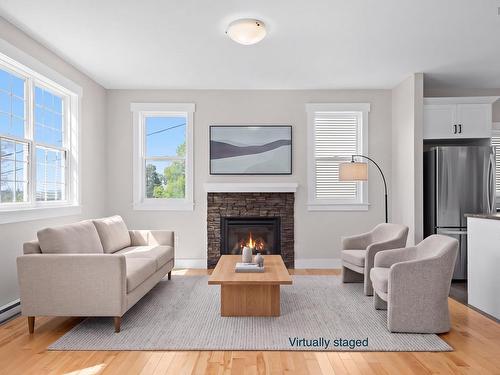 7 Copperhead Road, Fall River, NS - Indoor Photo Showing Living Room With Fireplace