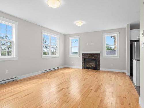 7 Copperhead Road, Fall River, NS - Indoor Photo Showing Living Room With Fireplace