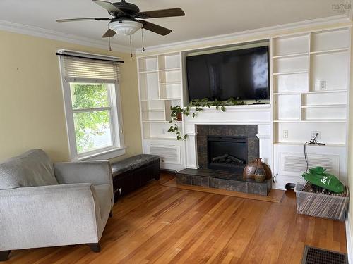 50 Rose Avenue, Trenton, NS - Indoor Photo Showing Living Room With Fireplace