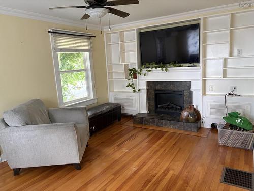 50 Rose Avenue, Trenton, NS - Indoor Photo Showing Living Room With Fireplace