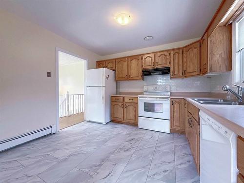 4 Abbey Drive, Charlottetown, PE - Indoor Photo Showing Kitchen With Double Sink