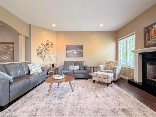 24 Brookwood Drive, Brandon, MB - Indoor Photo Showing Living Room With Fireplace